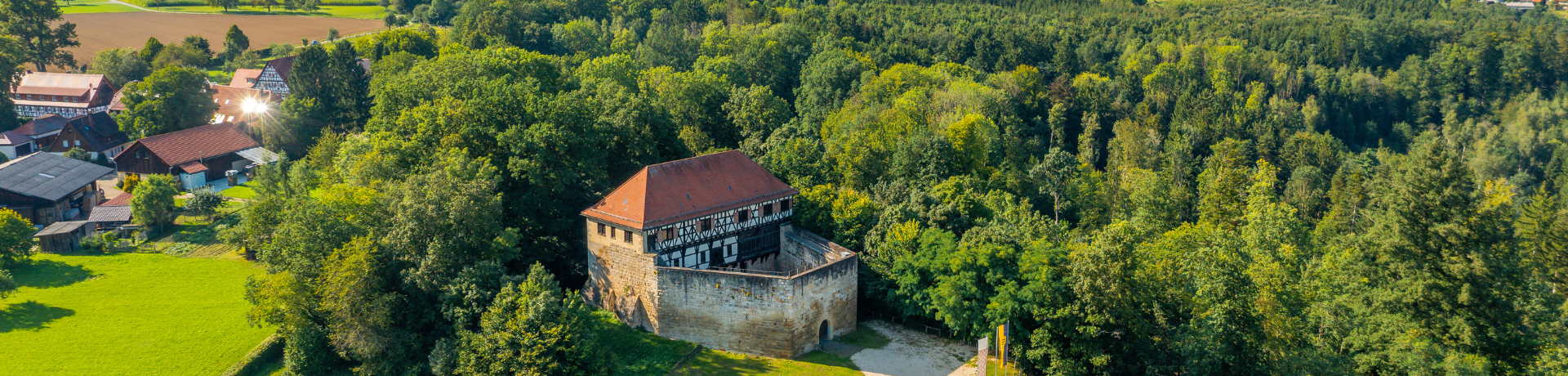 kopfgrafik-staufer-runde